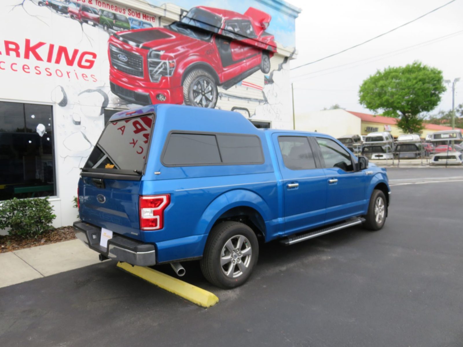 2018-blue-ford-f150-ranch-supreme-xd-topper-p.s-rear.jpg
