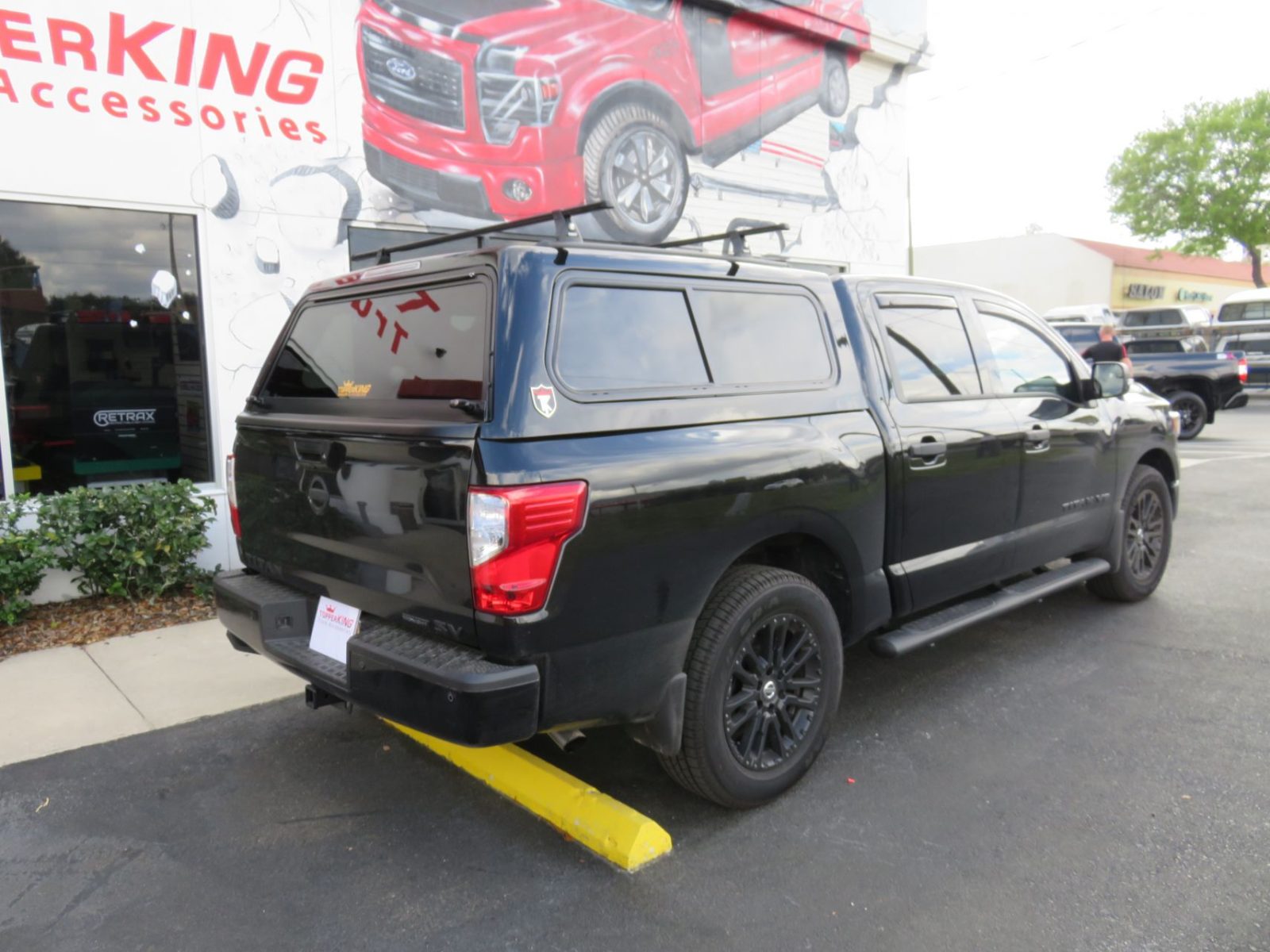 2019-black-nissan-titan-TK-defender-topper-ps-rear.jpg